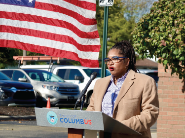 dr chapman speaking at podium